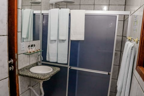 Quadruple Room | Bathroom | Shower, free toiletries, hair dryer, towels