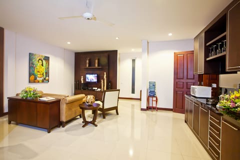 Royal Villa, 2 Bedrooms, Private Pool | Living area | 48-inch LED TV with cable channels, TV, DVD player