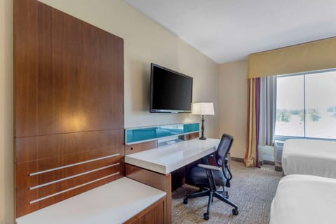 Suite, 2 Queen Beds & Sofa Bed, Non-Smoking | Down comforters, desk, laptop workspace, blackout drapes