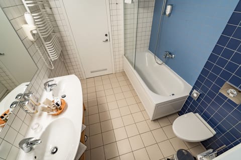 Apartment with balcony and SPA access | Bathroom | Shower, hair dryer, bathrobes, towels