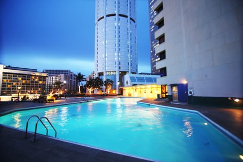 Outdoor pool, pool umbrellas, sun loungers