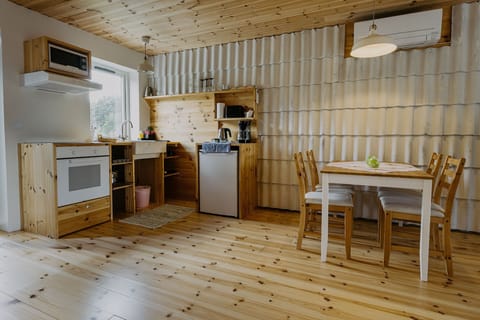 Design Apartment | Private kitchen | Fridge, microwave, highchair