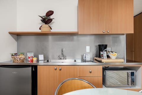 Suite, 2 Double Beds | Private kitchenette | Fridge, dining tables