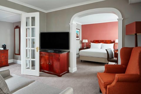 Suite, 1 Bedroom | Living room | 49-inch flat-screen TV with satellite channels, TV