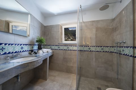 Superior Double Room, Terrace, Sea View | Bathroom | Combined shower/tub, free toiletries, hair dryer, bathrobes