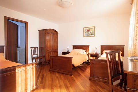 Classic Room, 3 Twin Beds | Down comforters, individually decorated, individually furnished