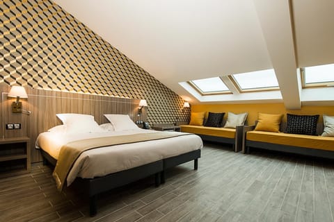 Quadruple Room | Minibar, in-room safe, individually furnished, desk