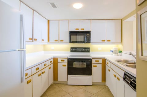 Condo, 2 Bedrooms, Beachfront | Private kitchen | Fridge, microwave, stovetop, dishwasher