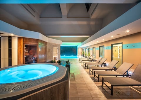 Indoor pool, open 7:00 AM to 10:00 PM, sun loungers