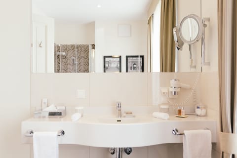 Deep soaking tub, eco-friendly toiletries, hair dryer, bathrobes