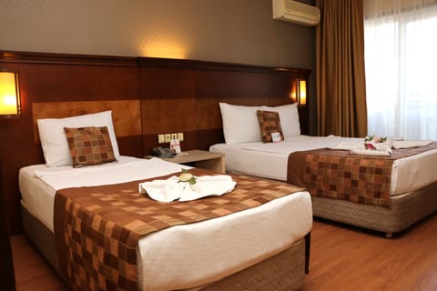 Standard Room | Minibar, desk, free cribs/infant beds, free WiFi