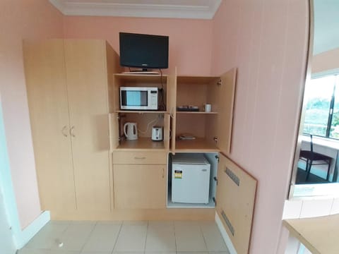 Fridge, microwave, coffee/tea maker, electric kettle