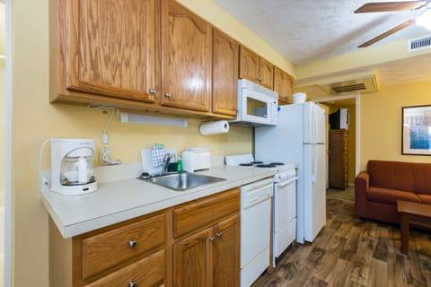 Family Condo, 2 Bedrooms | Private kitchen | Fridge, microwave, coffee/tea maker, toaster