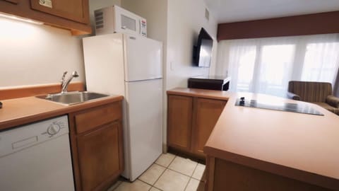 Standard Suite, 2 Bedrooms | Private kitchen | Fridge, microwave, coffee/tea maker, cookware/dishes/utensils