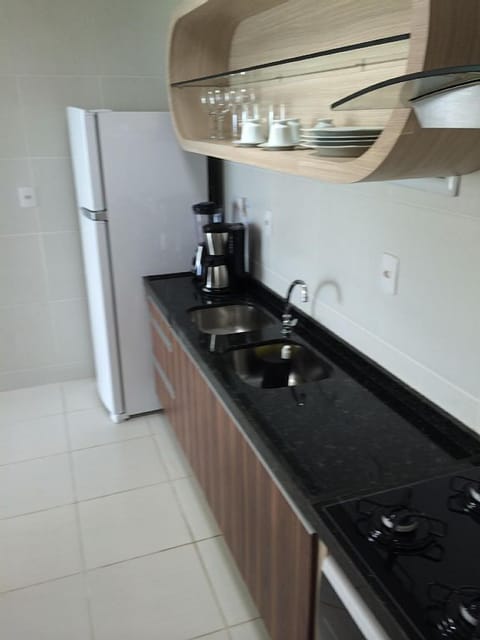 Deluxe Apartment, 2 Bedrooms, Partial Sea View | Private kitchen | Fridge, microwave, stovetop, coffee/tea maker