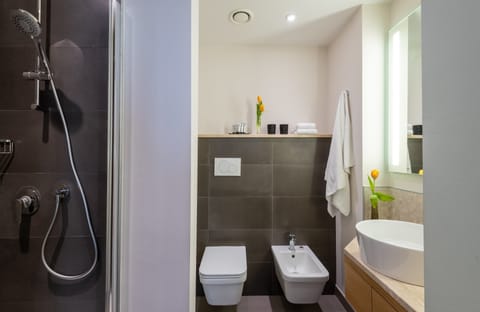 Shower, eco-friendly toiletries, hair dryer, bidet