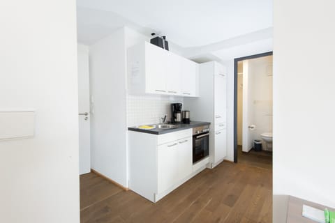 Apartment, 1 Bedroom | Private kitchen | Fridge, stovetop, coffee/tea maker, electric kettle