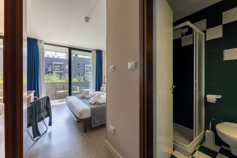 Comfort Room, Garden Area | In-room safe, desk, blackout drapes, free WiFi