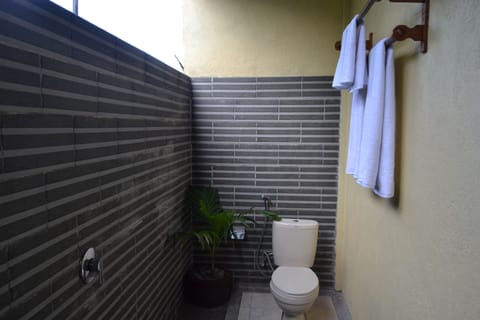 Standard Double Room | Bathroom | Shower, hair dryer, towels