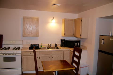 Deluxe Studio Suite, 1 Bedroom | Private kitchen | Fridge, microwave, coffee/tea maker