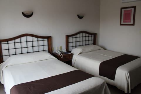 Standard Room, 2 Double Beds | In-room safe, iron/ironing board, free WiFi, wheelchair access