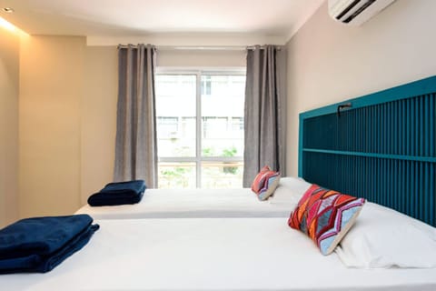 Premium bedding, pillowtop beds, minibar, individually decorated