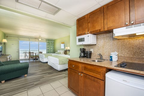 Standard Room, 2 Double Beds, Kitchenette, Ocean View | In-room safe, laptop workspace, iron/ironing board, free WiFi