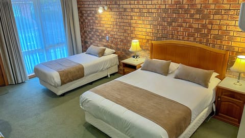 Standard Room - 1 Queen Bed and 1 Twin Bed or 1 Queen Bed | Desk, soundproofing, iron/ironing board, free WiFi