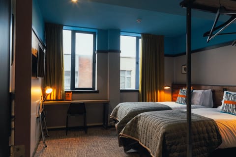 Twin Room (Comfy) | Living area | Flat-screen TV