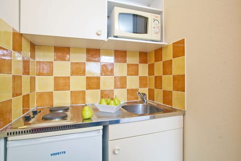 Fridge, microwave, cookware/dishes/utensils