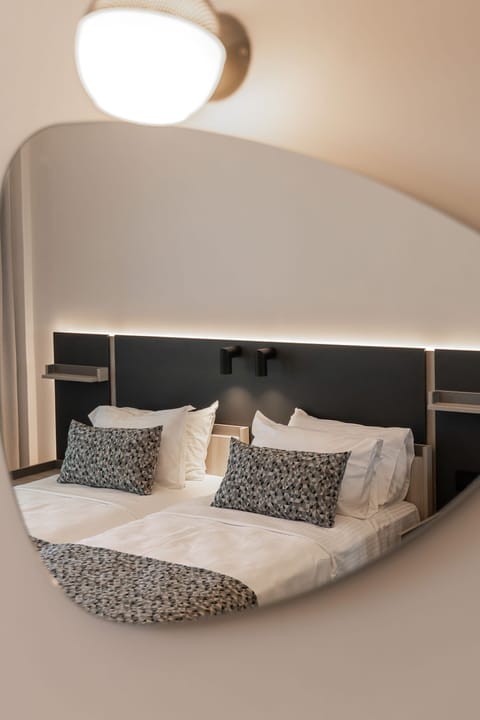 Junior Suite with Sea View | Egyptian cotton sheets, premium bedding, memory foam beds, minibar