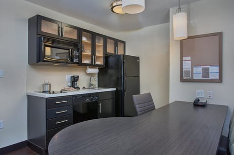 Suite, 1 Bedroom | Private kitchenette | Full-size fridge, microwave, stovetop, dishwasher