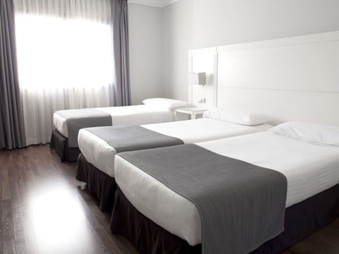 Triple Room | Premium bedding, minibar, in-room safe, individually furnished