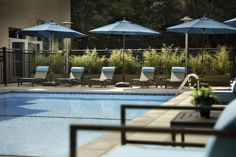 Outdoor pool, open 10:00 AM to 10:00 PM, pool umbrellas, sun loungers