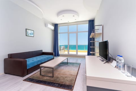 Two Bedroom Suite | Living area | 22-cm TV with cable channels