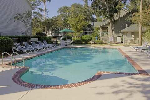 Outdoor pool, pool umbrellas, sun loungers