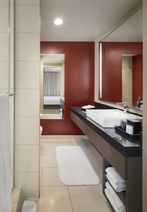 Suite, 1 King Bed, Balcony (Woodstock) | Bathroom | Shower, free toiletries, hair dryer, towels