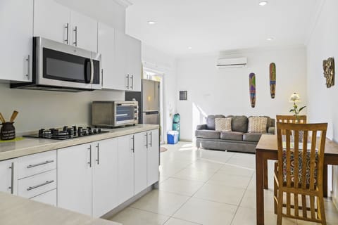 Deluxe Apartment, 1 Bedroom, Kitchen, Poolside | Private kitchen | Fridge, microwave, dishwasher, coffee/tea maker