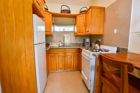 Superior Studio, 1 King Bed, Kitchenette, Garden View | Private kitchenette | Fridge, microwave, stovetop, coffee/tea maker