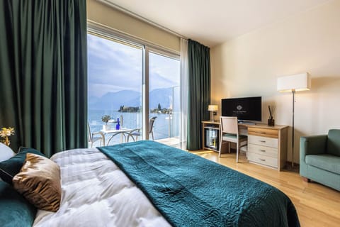 Comfort Double Room (pool/garden and lake view) | Premium bedding, minibar, in-room safe, desk