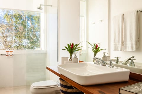 Classic Suite | Bathroom | Designer toiletries, hair dryer, bathrobes, towels