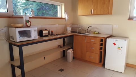 Studio Suite, Hot Tub, Lake View | Private kitchenette | Full-size fridge, microwave, stovetop, coffee/tea maker