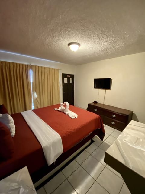 Standard Room, 1 Bedroom | In-room safe, desk, iron/ironing board, free WiFi