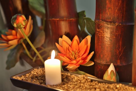 Deep soaking tub, rainfall showerhead, designer toiletries, hair dryer