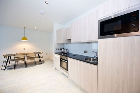 Apartment, 3 Bedrooms | Private kitchen | Fridge, microwave, oven, stovetop