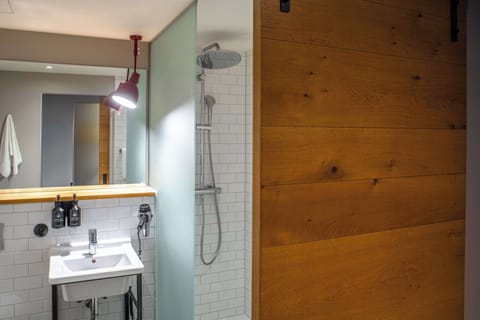 Shower, rainfall showerhead, designer toiletries, hair dryer