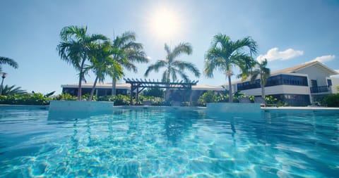 Outdoor pool, pool umbrellas, sun loungers