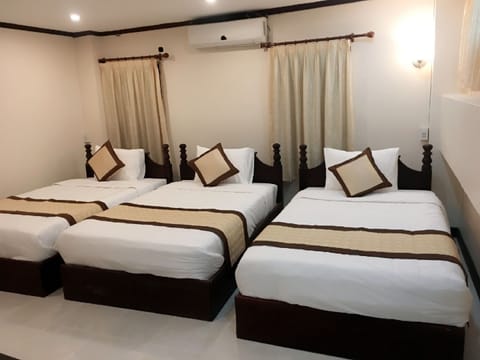 Standard Triple Room, 3 Singles | In-room safe, desk, free WiFi