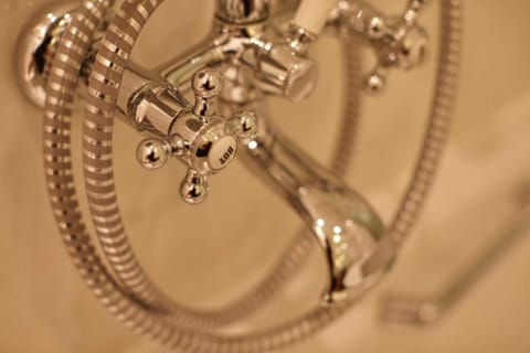 Combined shower/tub, hair dryer, bathrobes, slippers