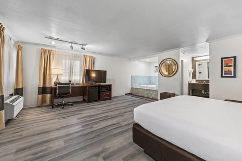 Suite, 1 King Bed, Non Smoking | Desk, iron/ironing board, free cribs/infant beds, rollaway beds